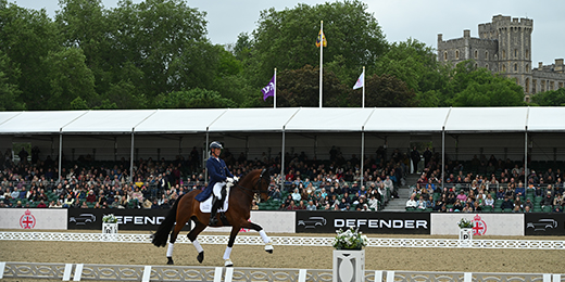 man riding dressage in front of windsor castle
