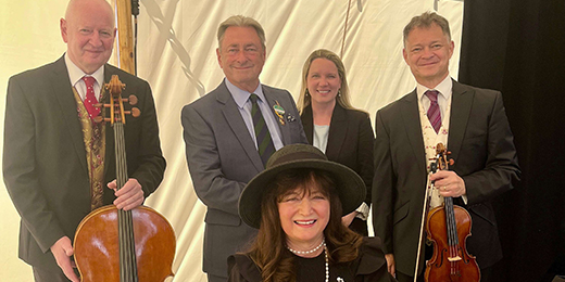 a group of musicians holding their instruments